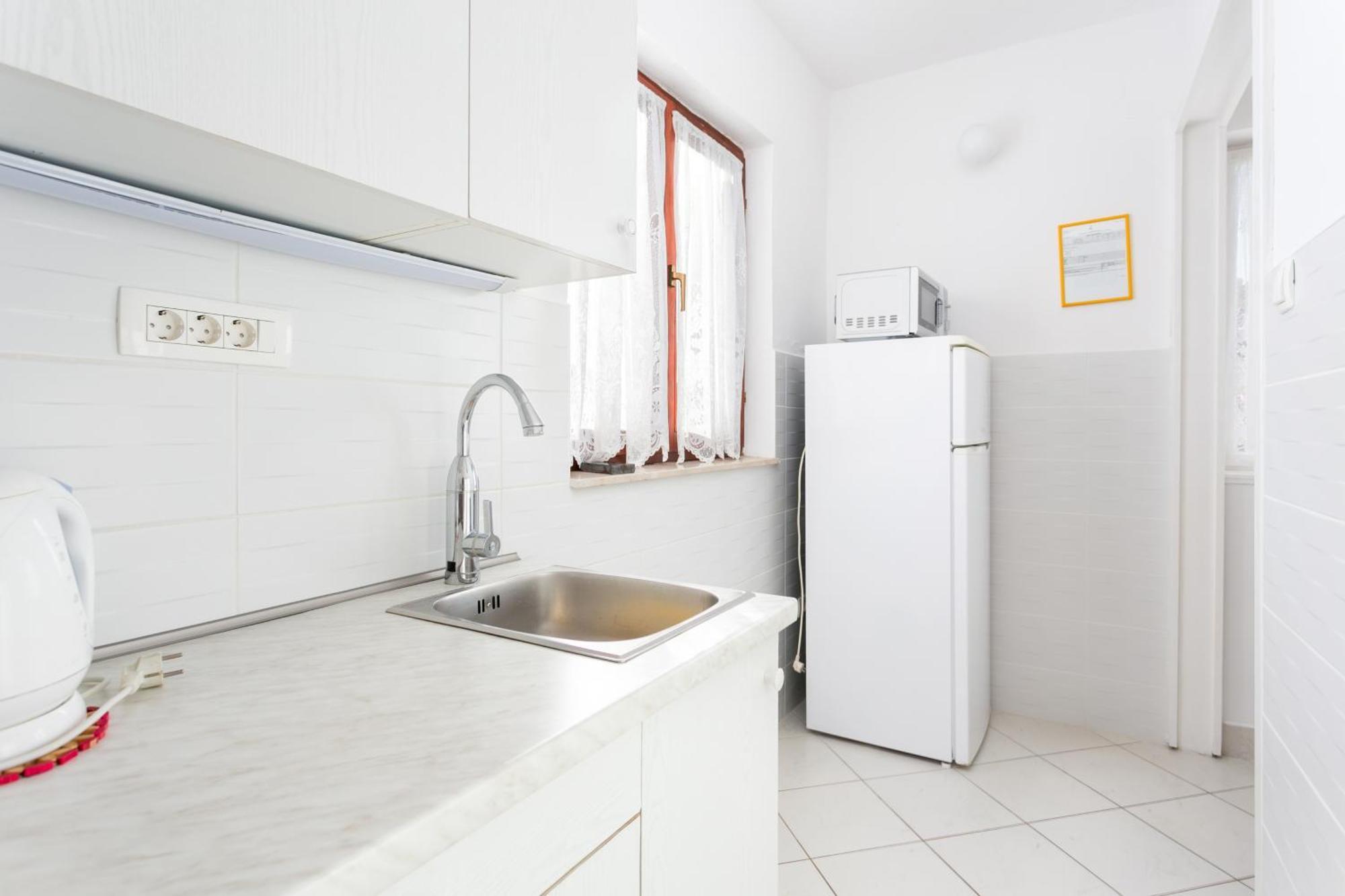 Apartments By The Sea Seget Vranjica, Trogir - 1038 Стая снимка